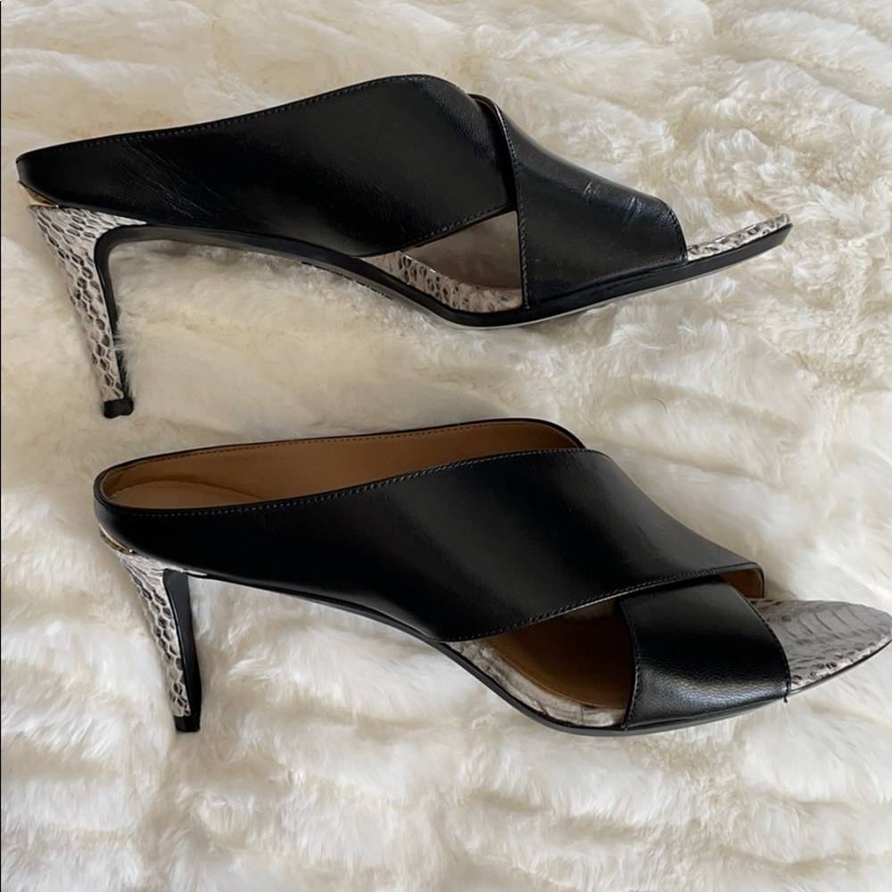 Calvin Klein black cross mules/ snake print detail